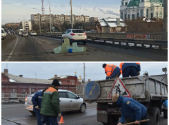 Как на Новом мосту картон на асфальт поменяли 