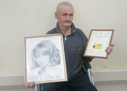 Астраханец удостоился памятной медали за портрет «Незнакомки» для выставки Совета Федерации России